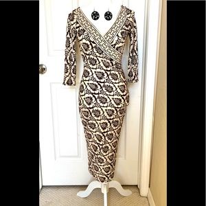 100% silk Tracy Reese, classy sexy comfortable! Free matching earrings!